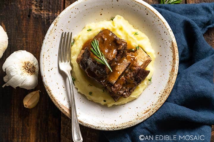 bowl of beef short ribs on mashed potatoes