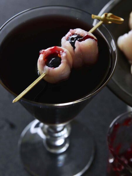 red wine sangria cocktail with bloody eyeballs for halloween featured image