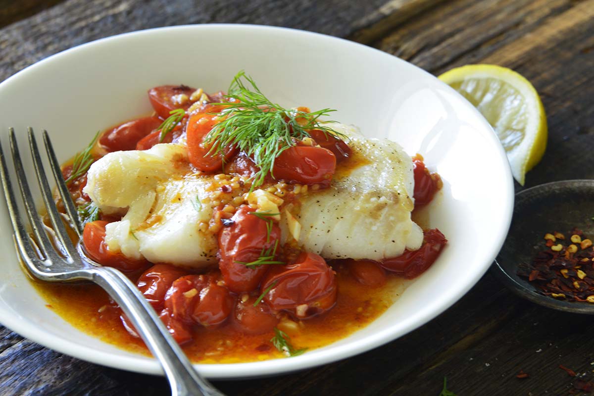 close up of healthy fish dinner in bowl