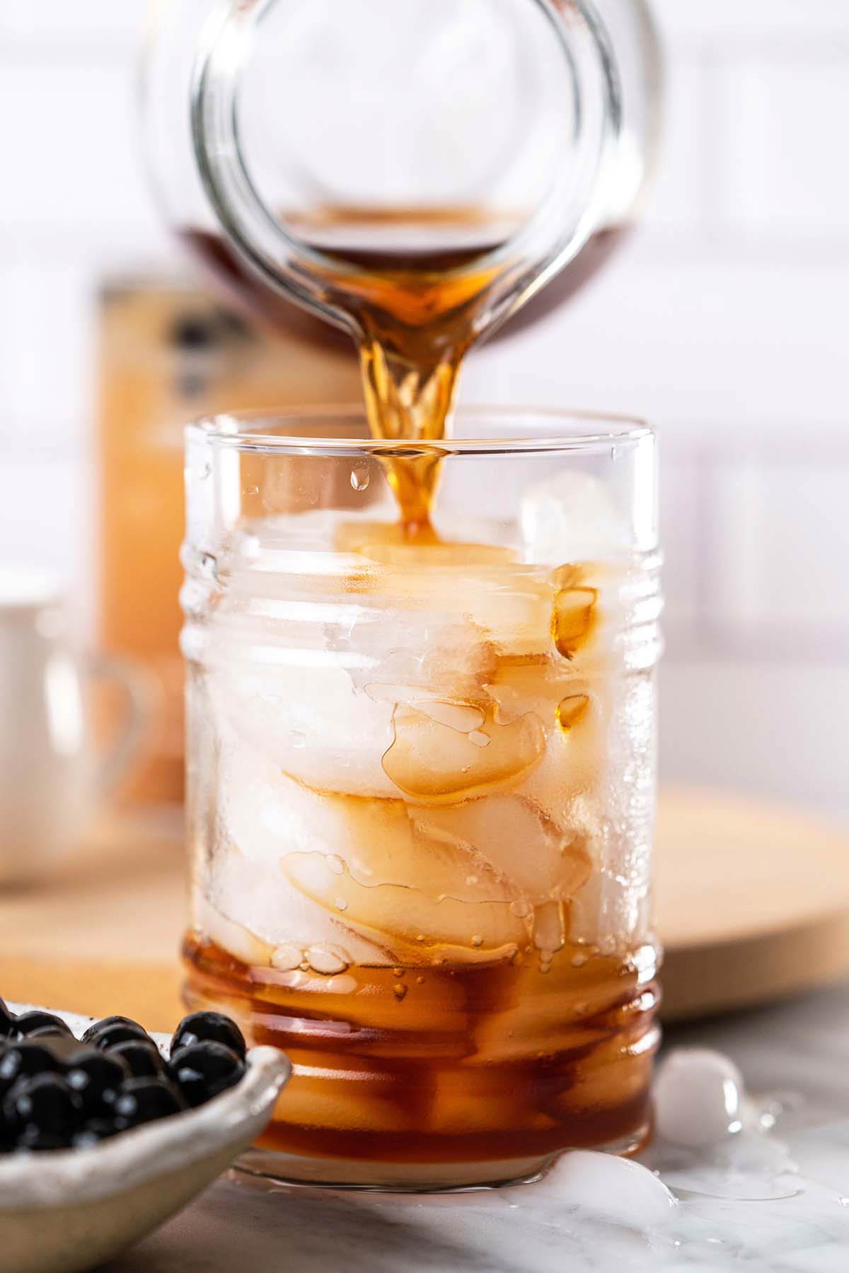 pouring tea over ice