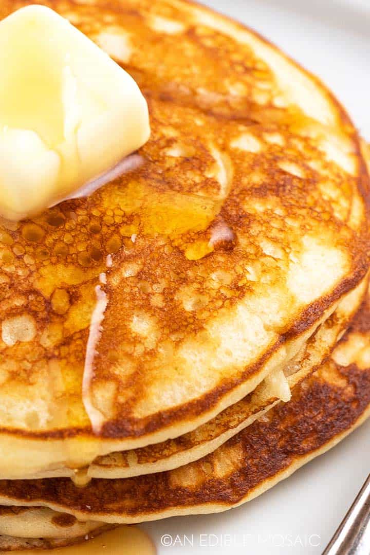 close up of stack of buttermilk pancakes