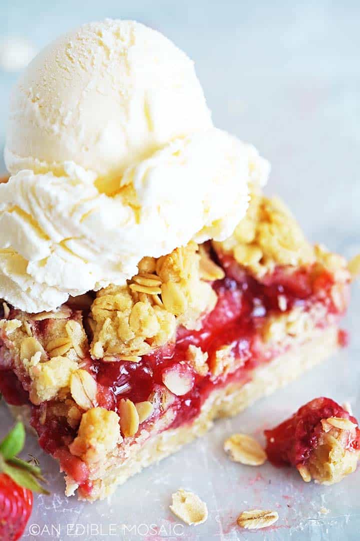 strawberry crumb bar with vanilla ice cream scoop