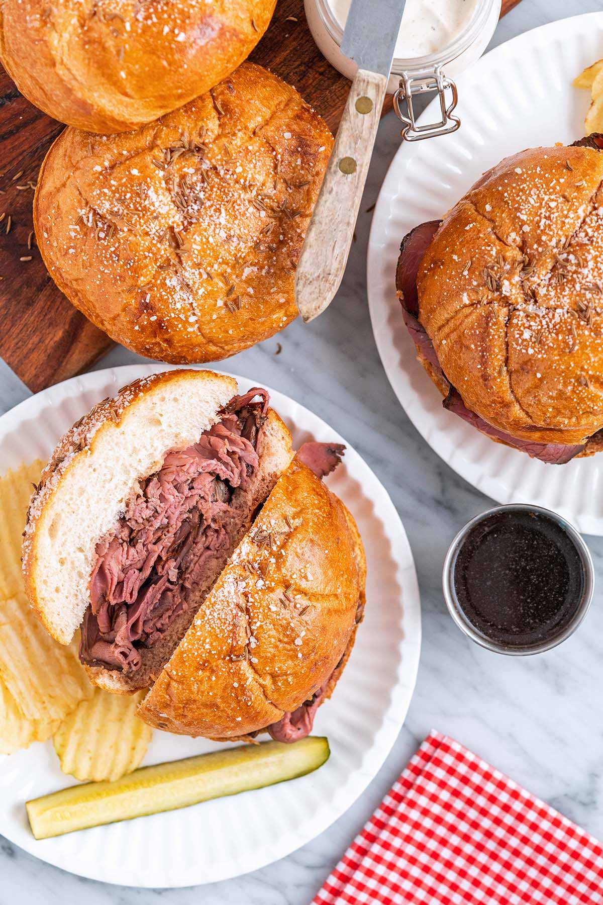homemade buffalo roast beef on Weck sandwiches with au jus and creamy horseradish sauce