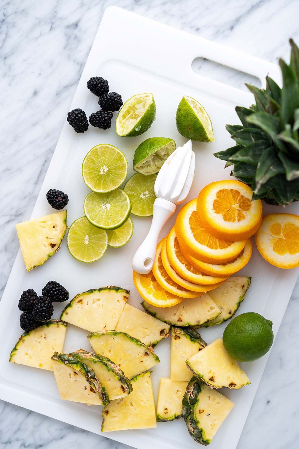 prepping garnishes for rum runner drink