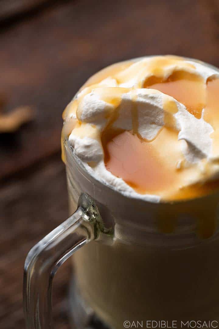 close up of caramel sauce on whipped cream on butterbeer drink