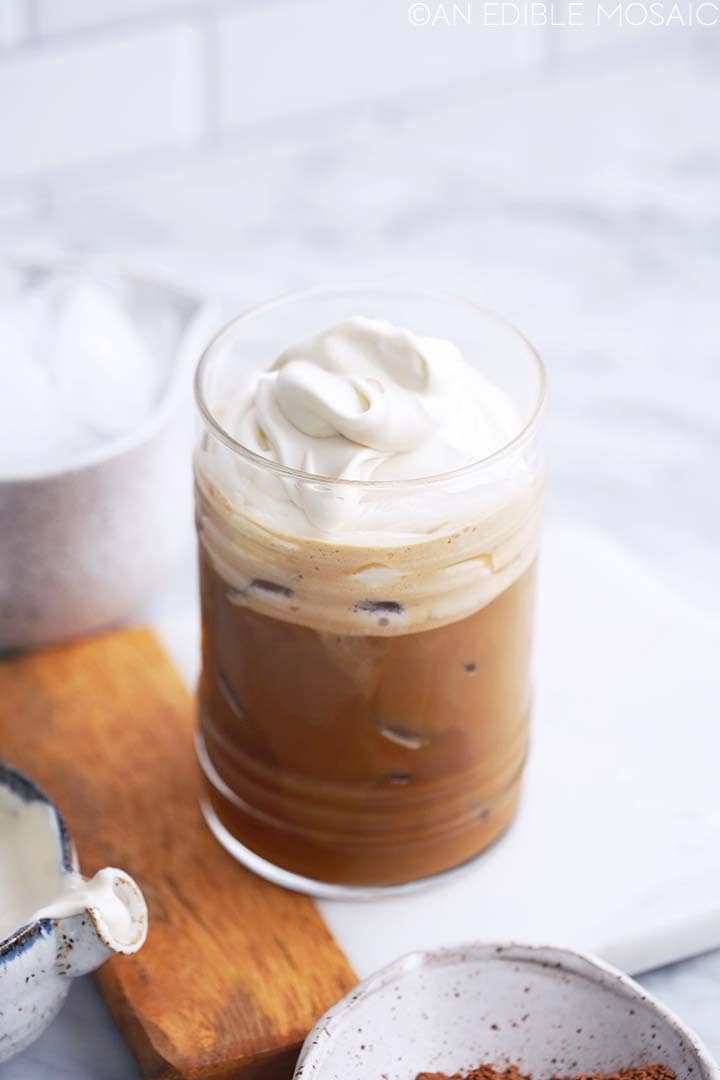 iced tiramisu latte with cream layer on top