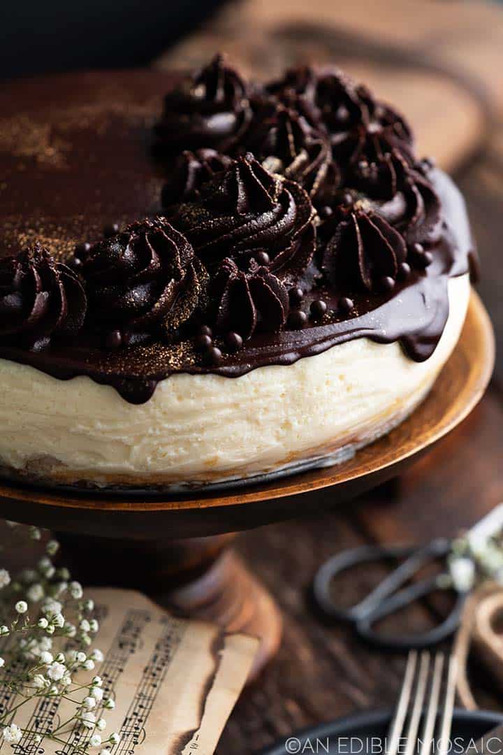 bird's milk cake recipe with chocolate flowers and gold glitter