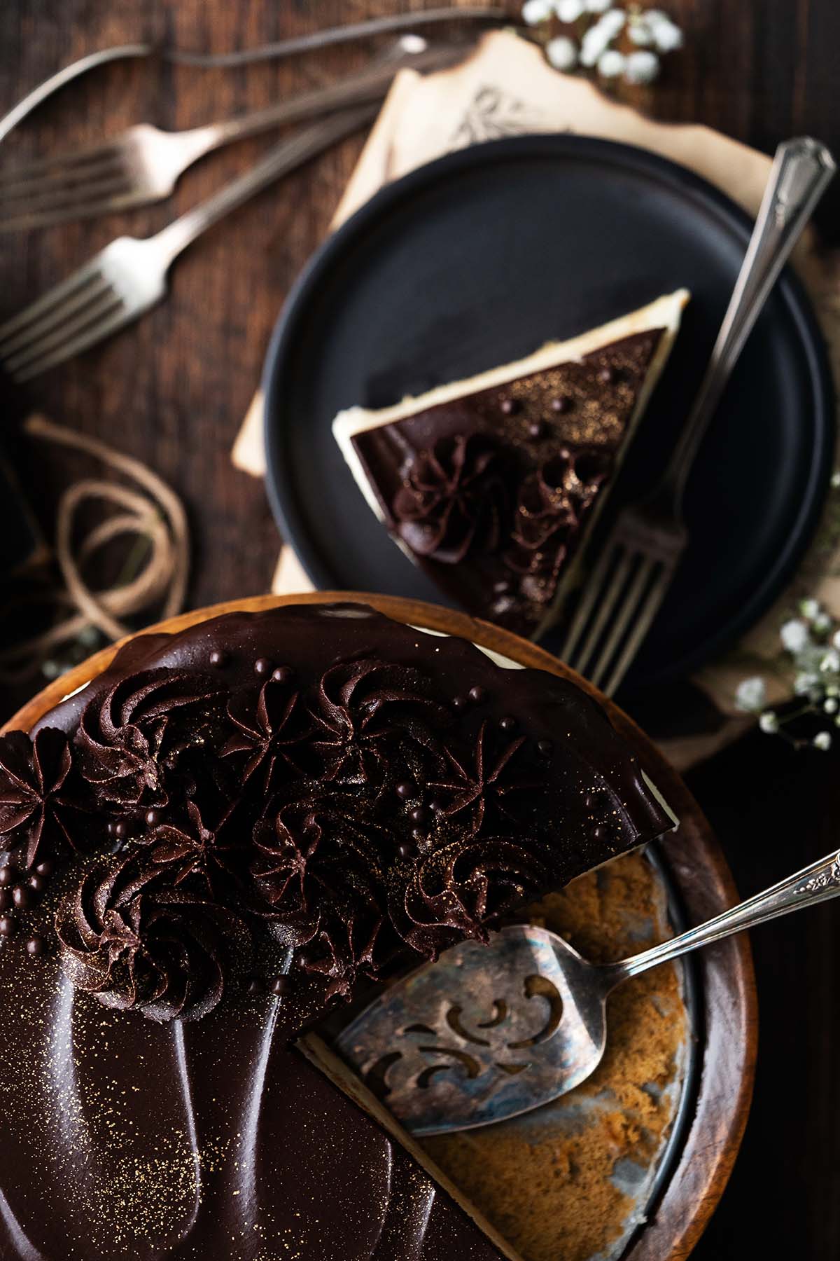 decadent layered sponge cake with sour cream mousse soufflé filling and chocolate ganache topping