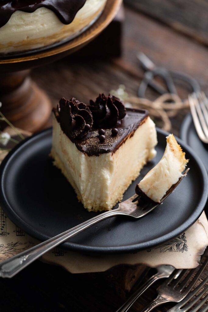 partially eating slice of old fashioned birds milk cake
