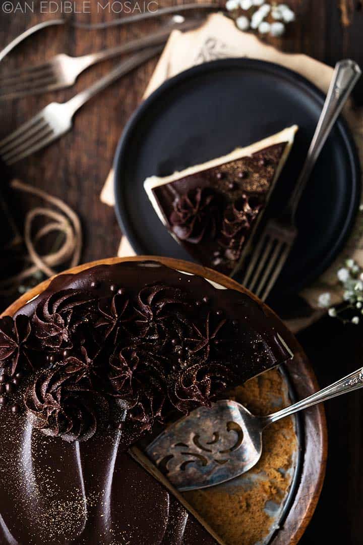 top view of cake on stand and slice on plate