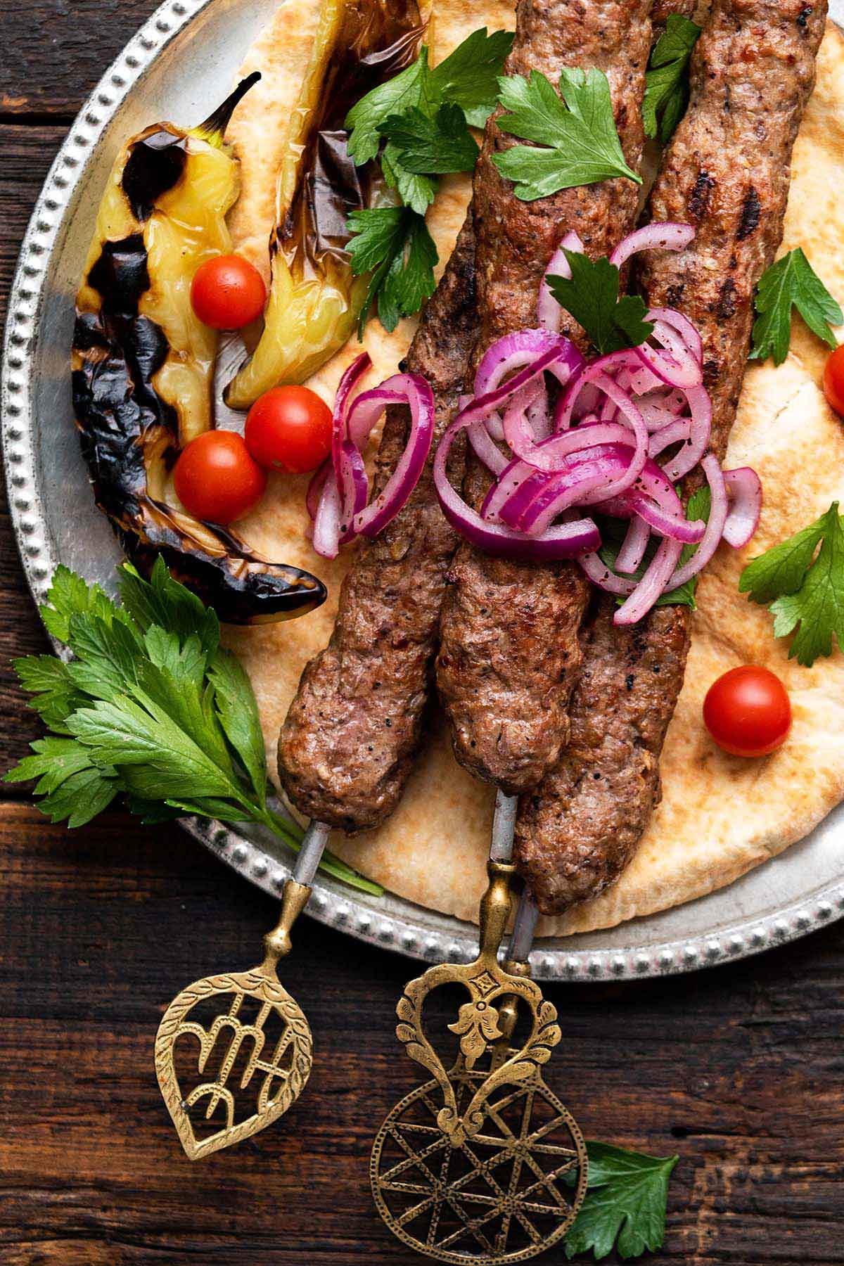 top view of plate of grilled Turkish adana kebabs