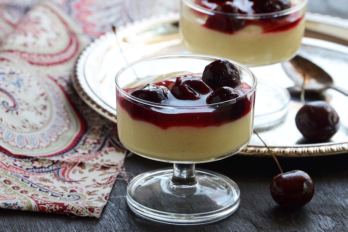 traditional bavarian cream topped with cherry sauce