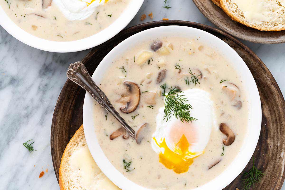 close up top view of Czech kulajda soup in bowl