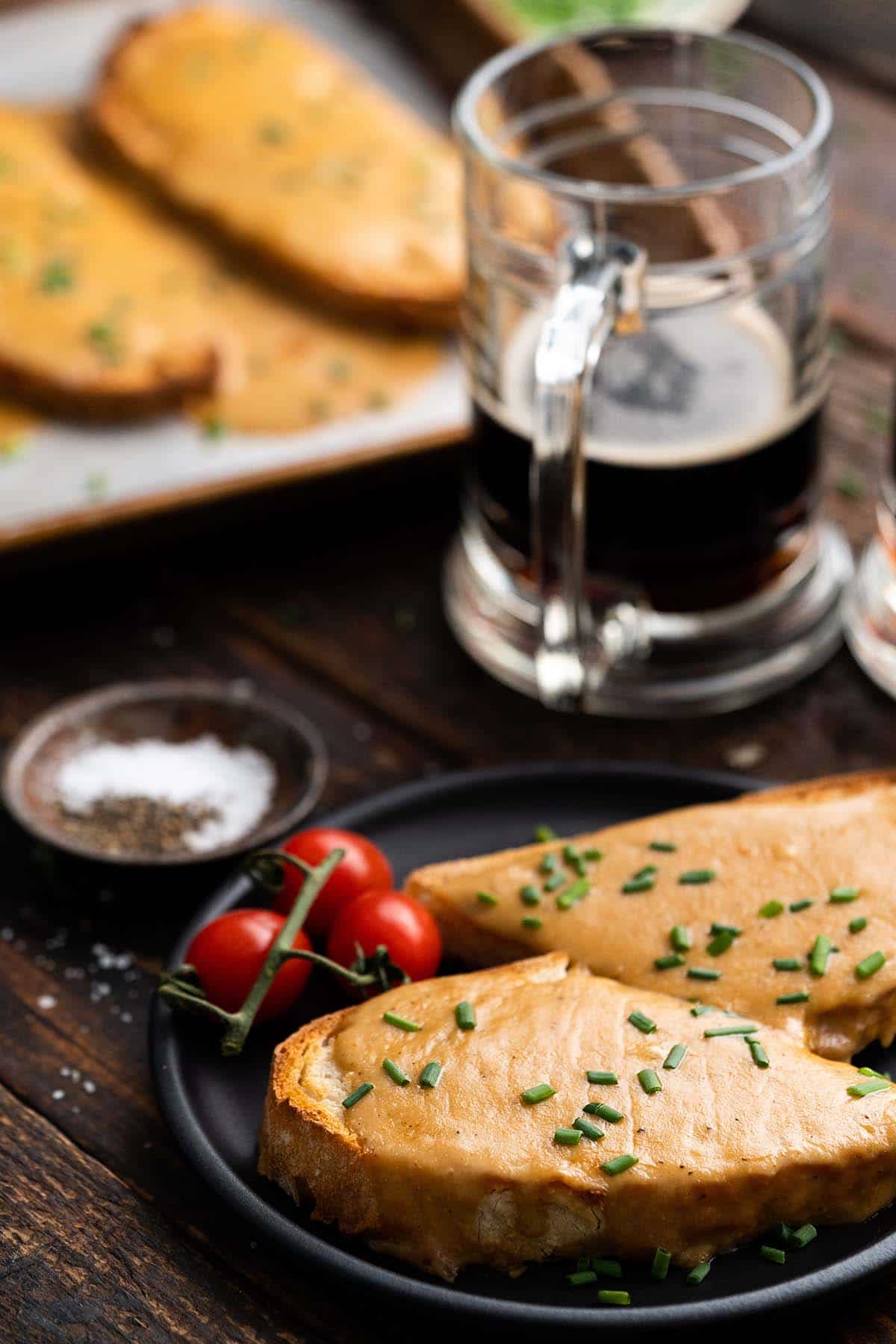 toast topped with cheesy welsh rarebit sauce