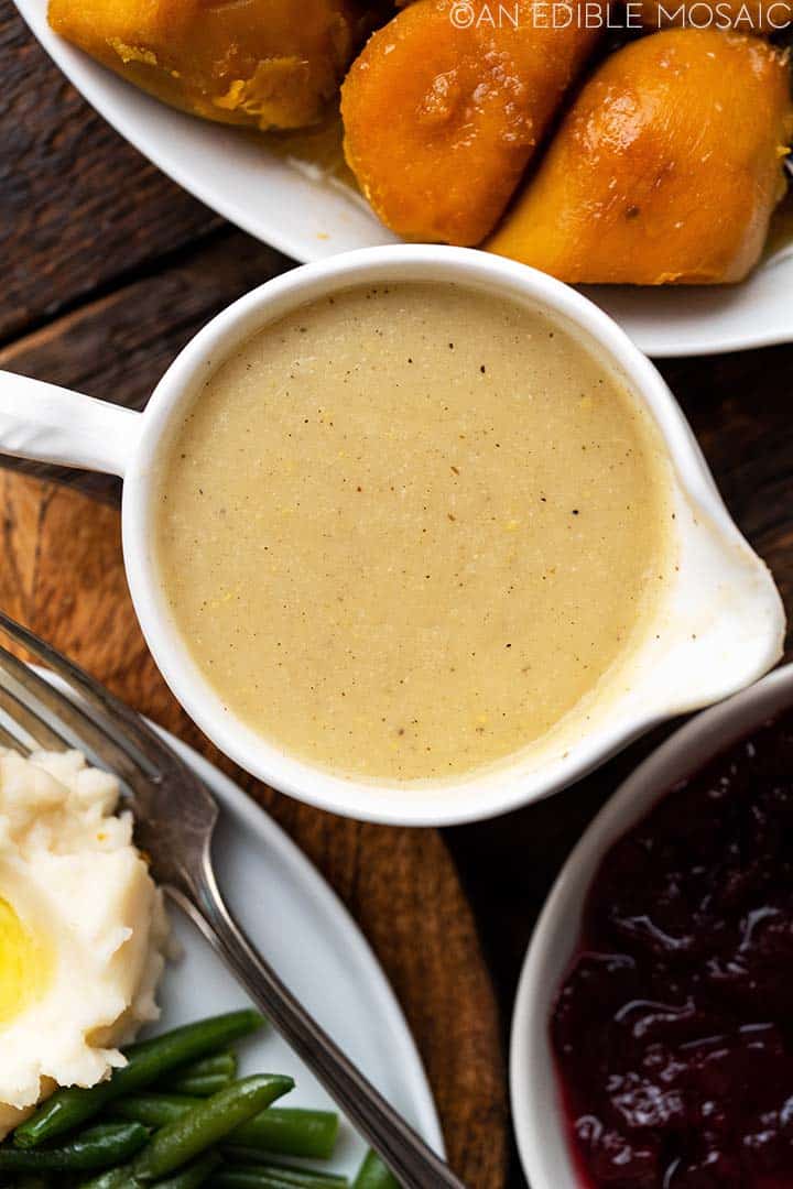 top view of gravy in white gravy boat