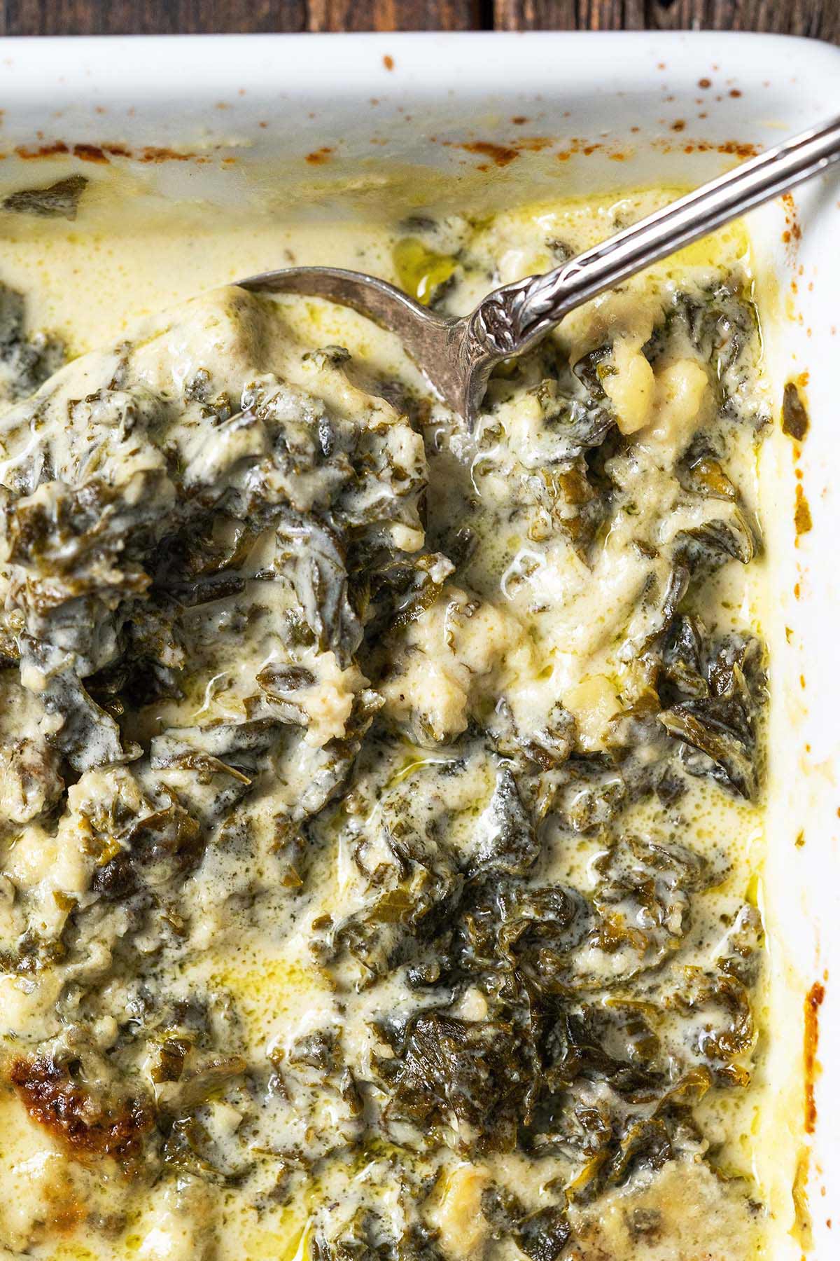 close up top view of low carb keto gluten free kale gratin