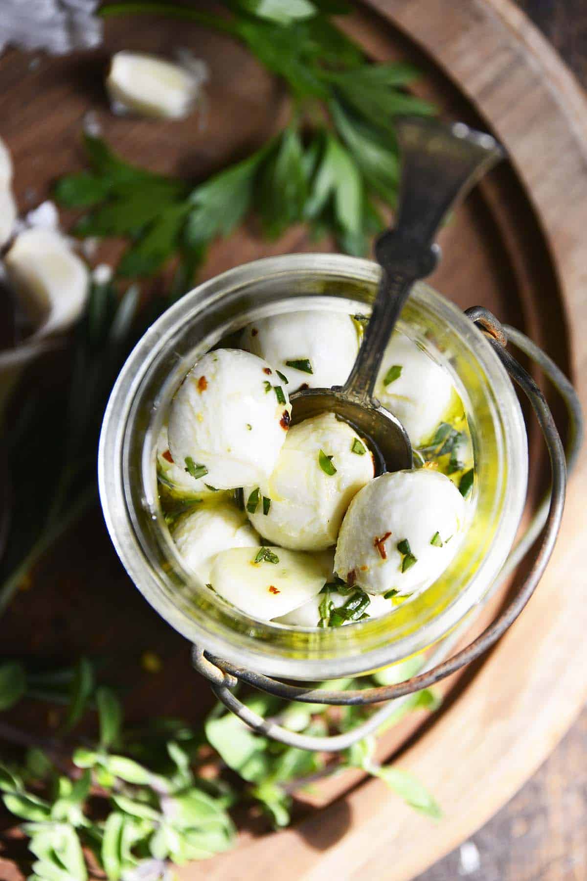 close up top view of homemade marinated mozzarella balls