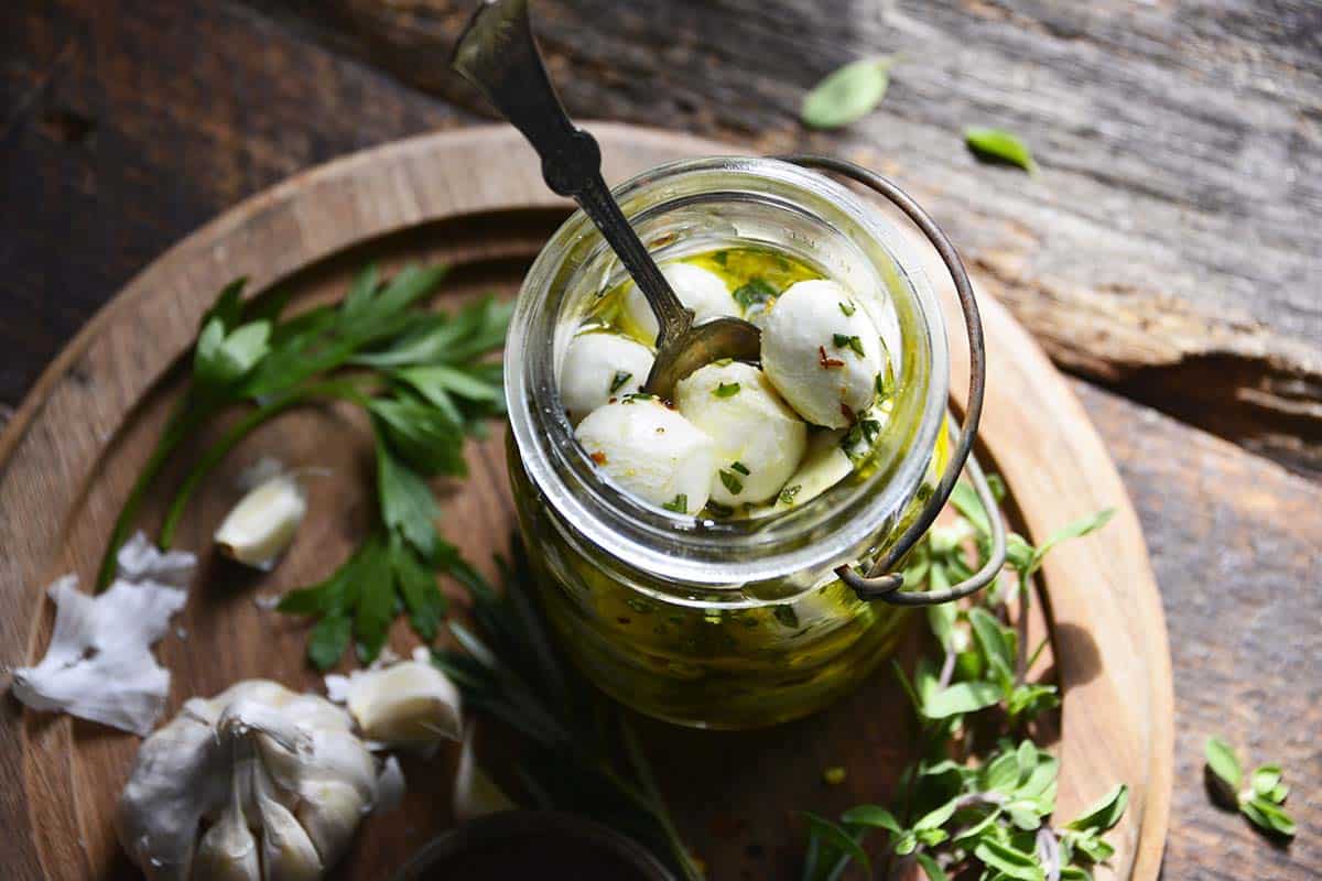 olive oil marinated mozzarella with garlic and herbs