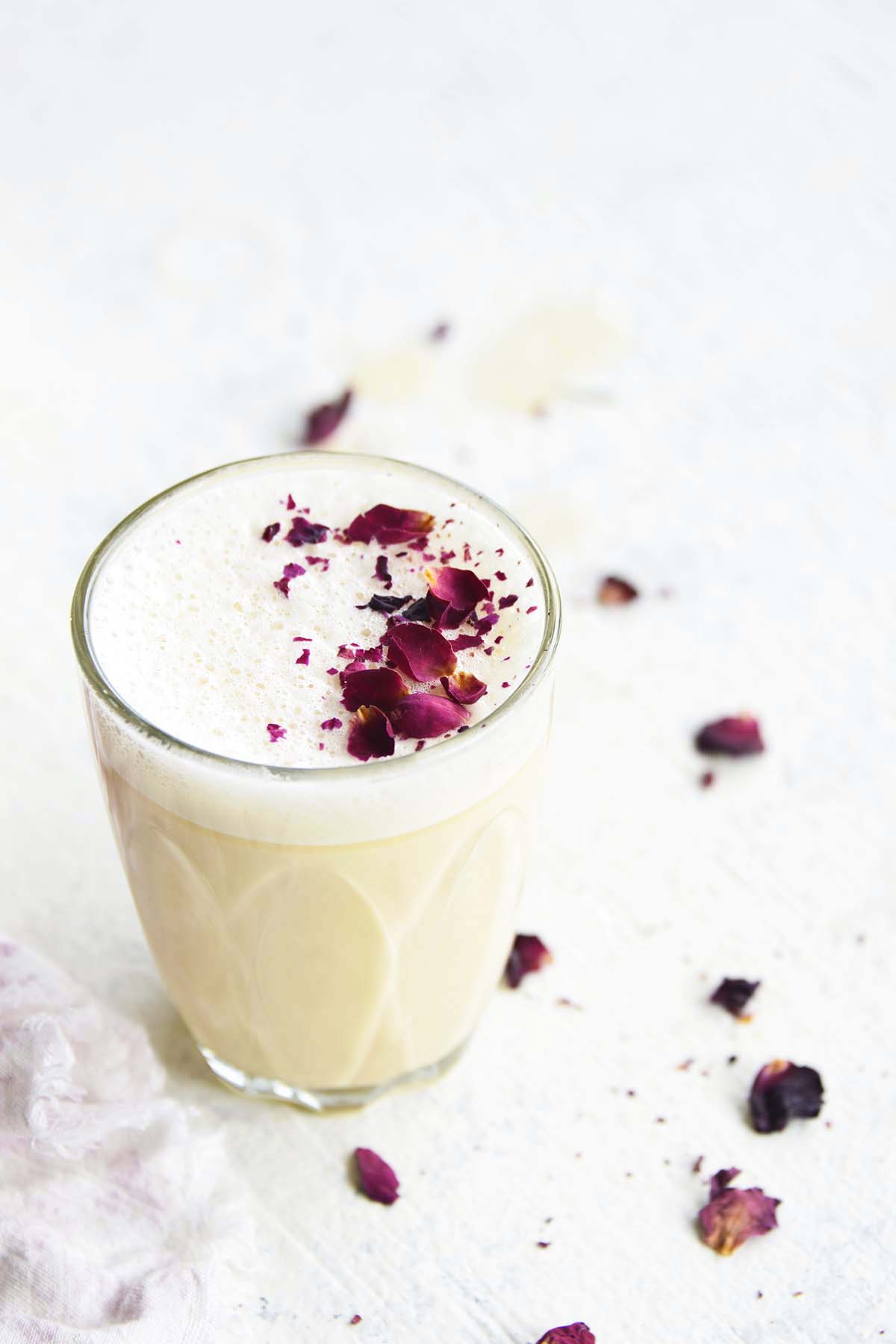 rose latte topped with dried rose petals