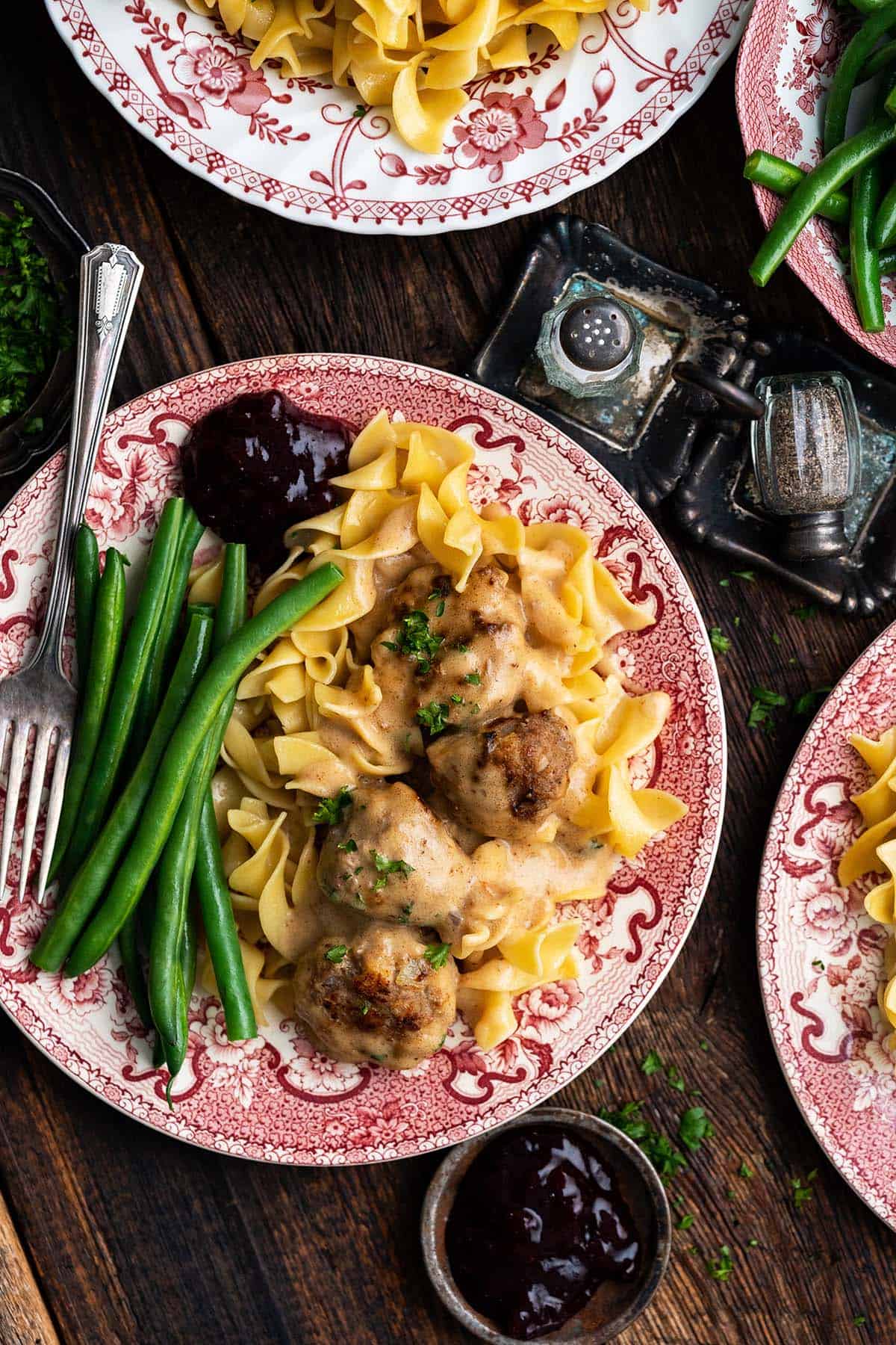swedish meatballs dinner with green beans and noodles