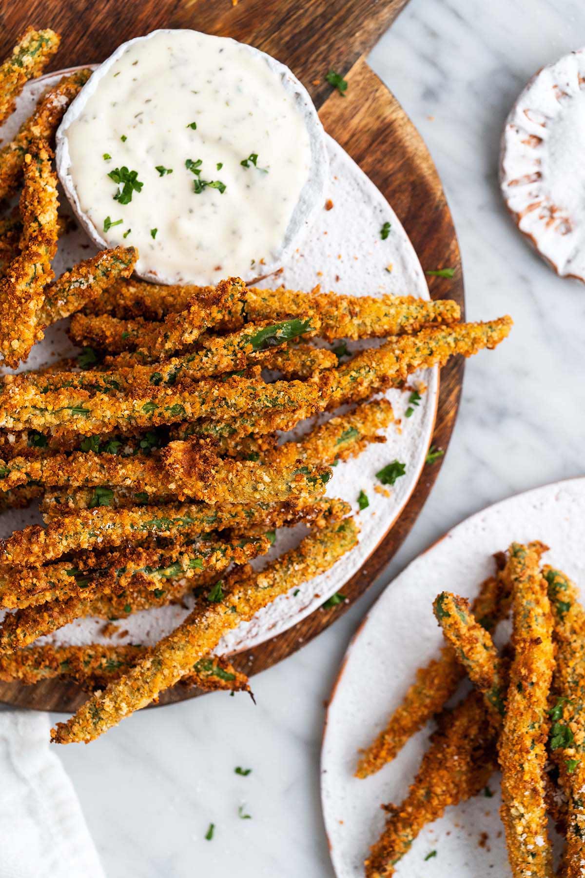 crispy breaded green bean fries on platter