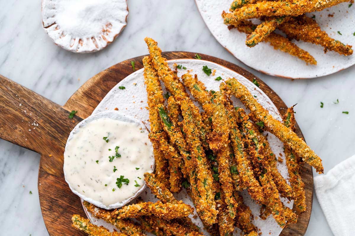 crunchy green bean fries on white ceramic plate