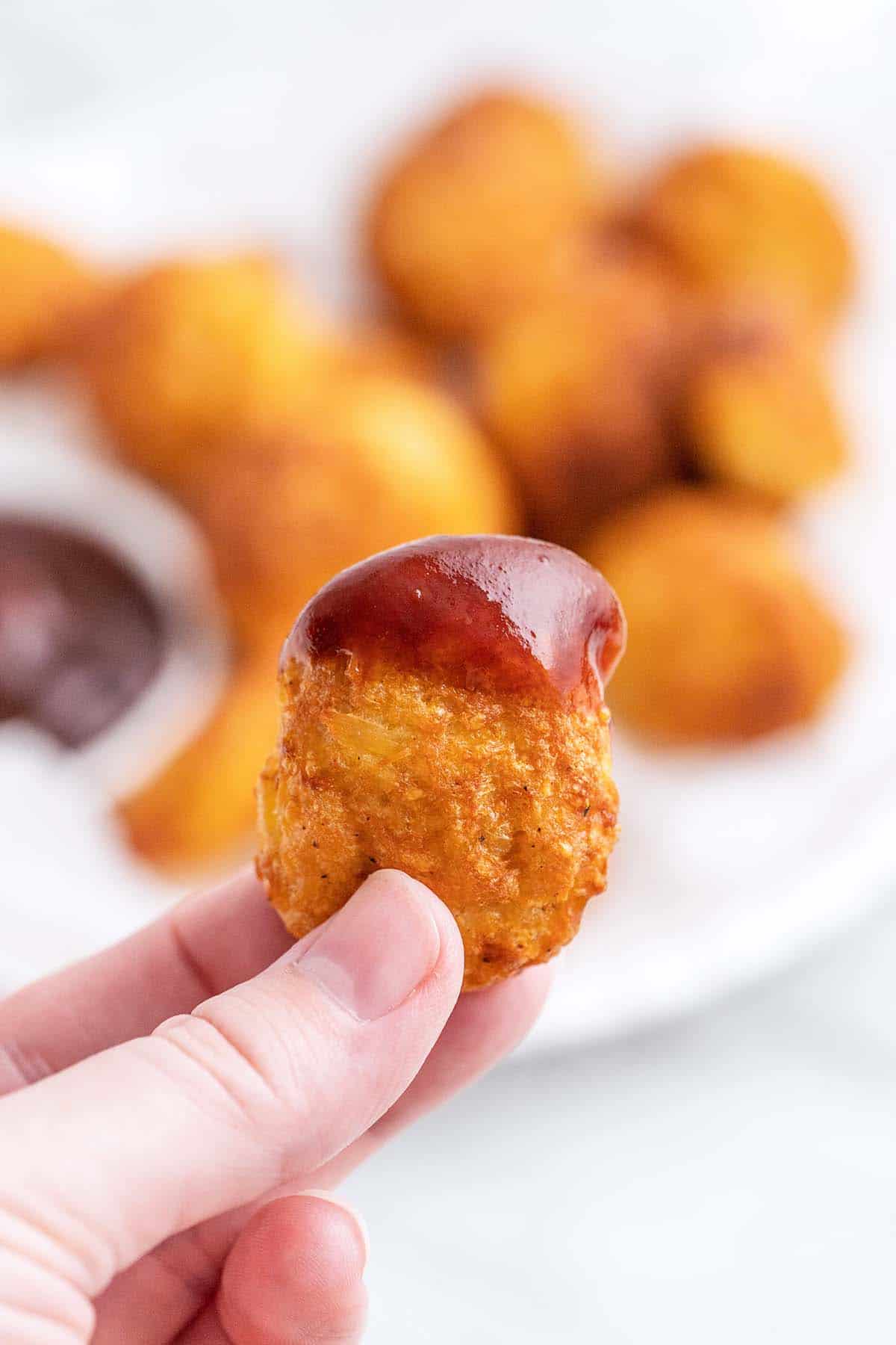 keto air fryer chicken nugget dipped in bbq sauce