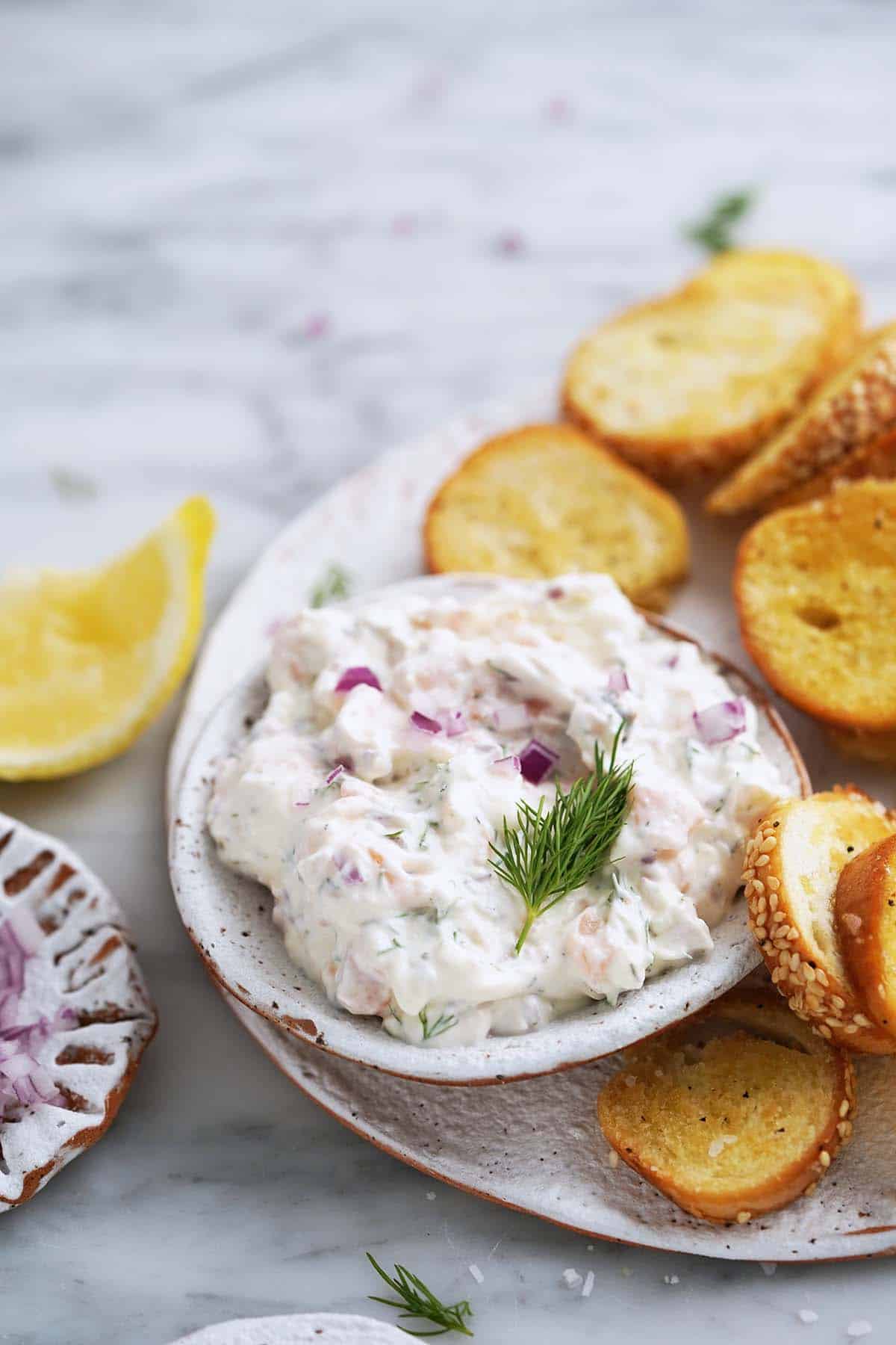 close up front view of smoked salmon dip with dill