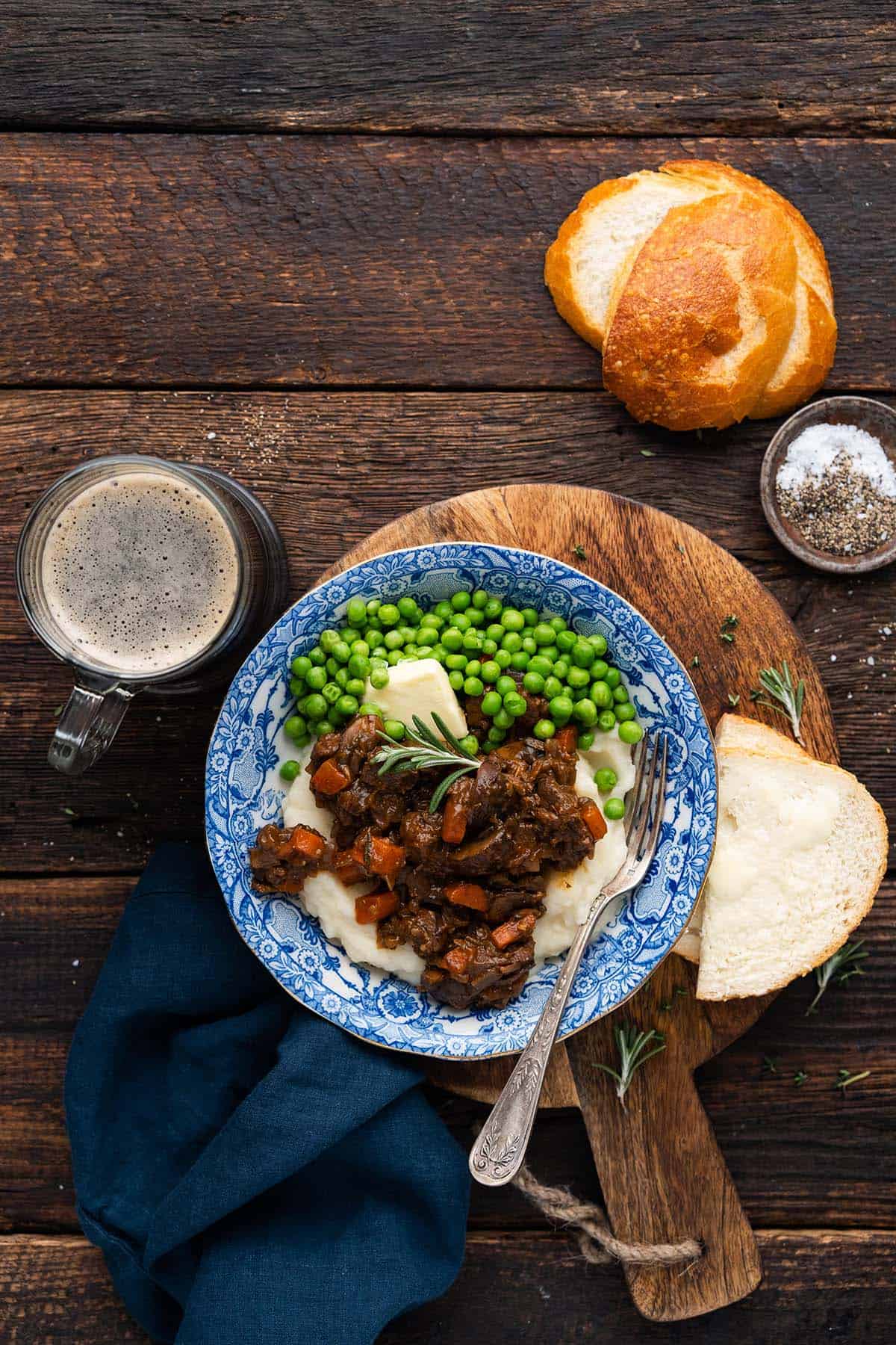 meal of british beef and ale stew with mug of ale