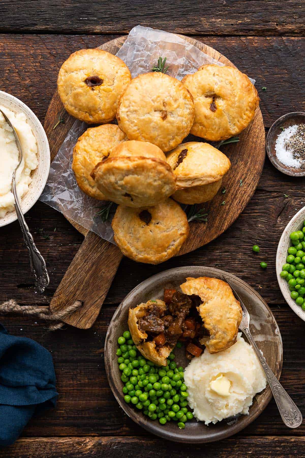 spread of meal with mini beef pot pies