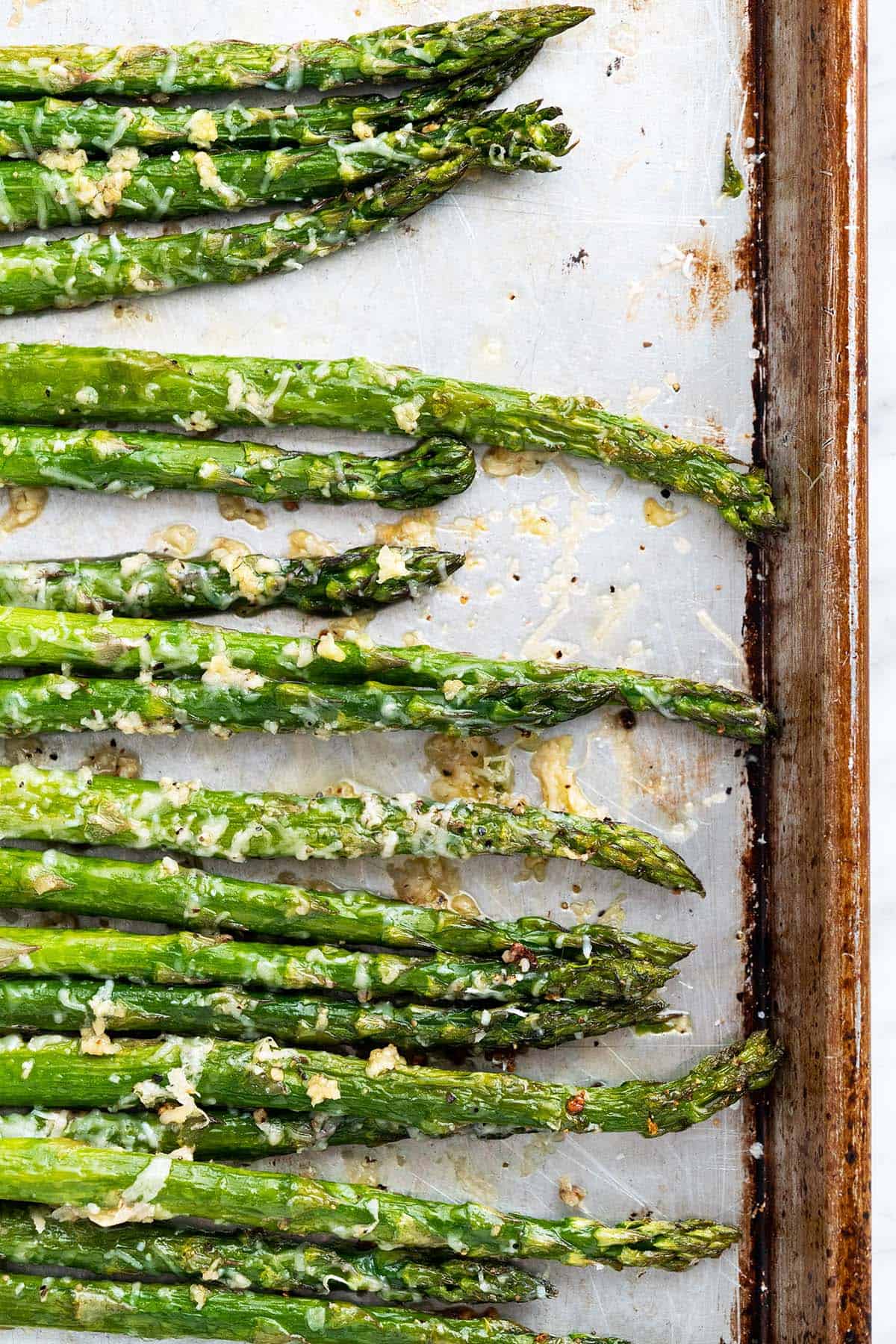 garlic parm roasted asparagus on baking tray