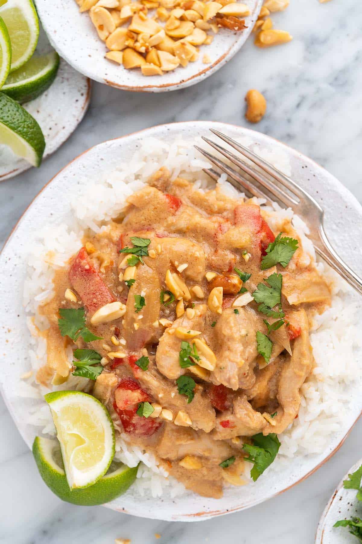 plate of thai peanut chicken with rice