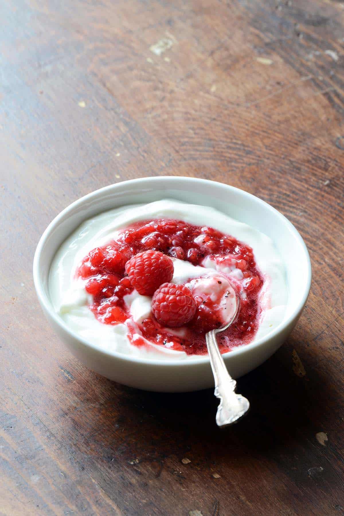 whipped yogurt with raspberry sauce and sumac