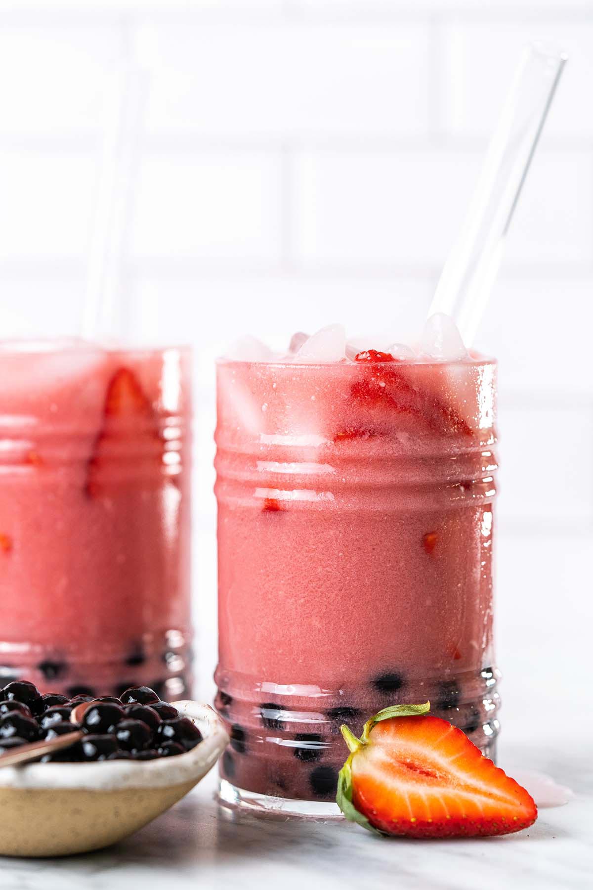 strawberry bubble tea with black pearl boba