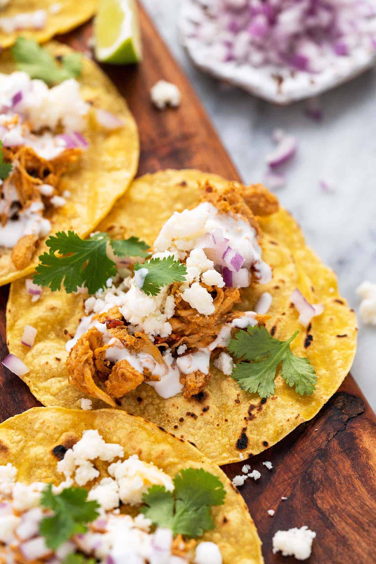 shedded chicken tacos recipe with crema and chipotle