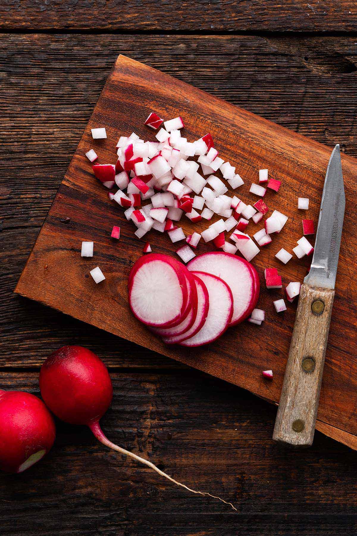 chopping fresh radishes
