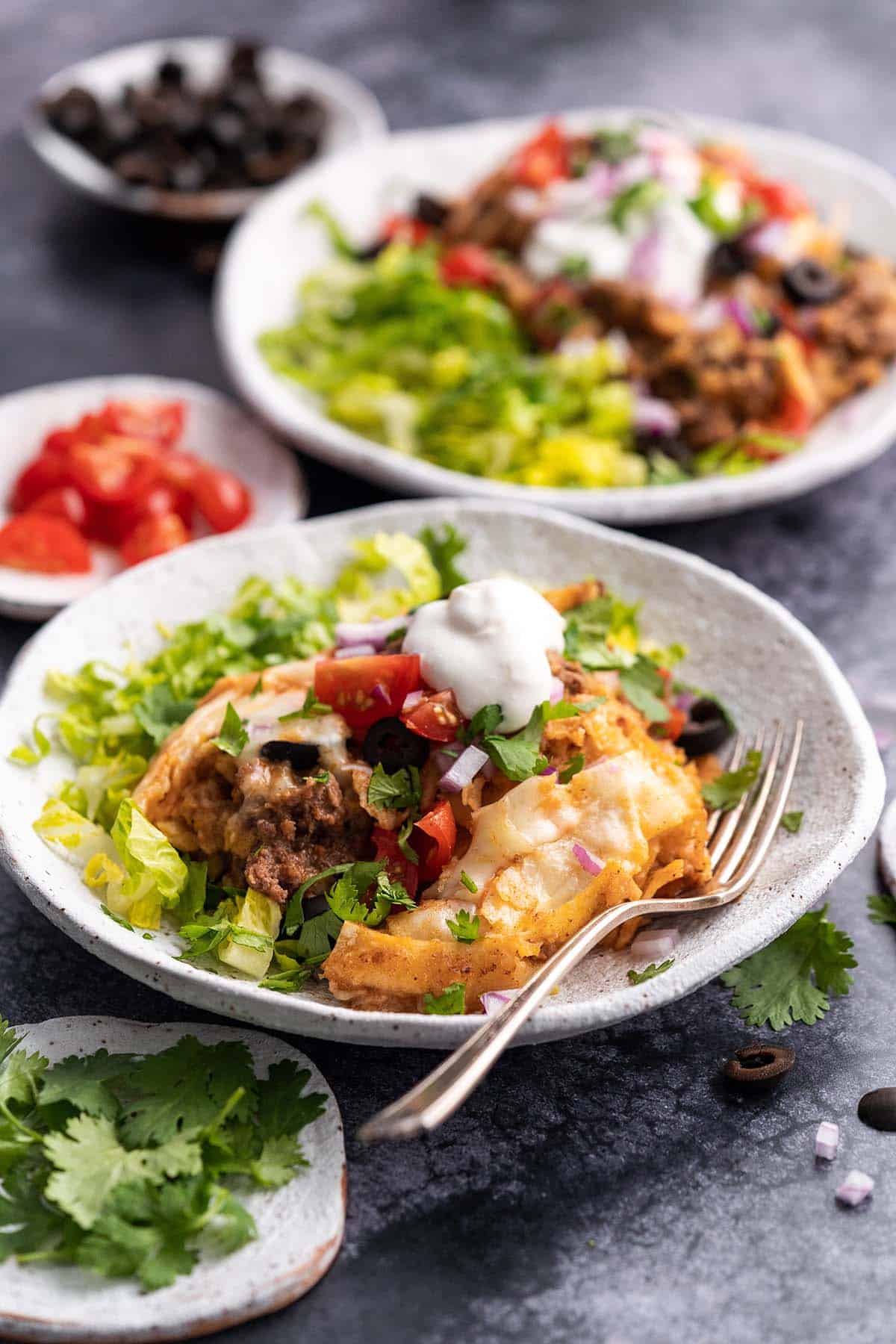 crockpot enchiladas meal with vegetable toppings