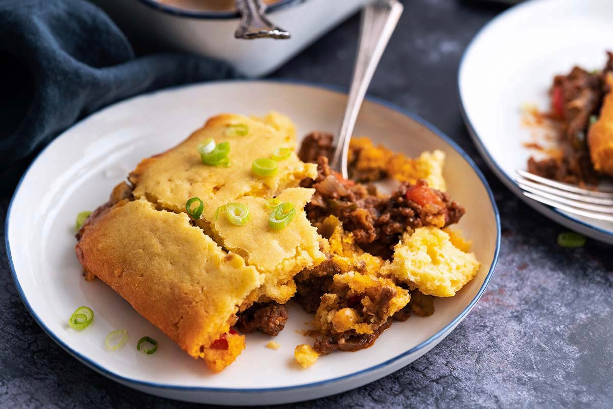sloppy Joe casserole on blue rimmed white plate