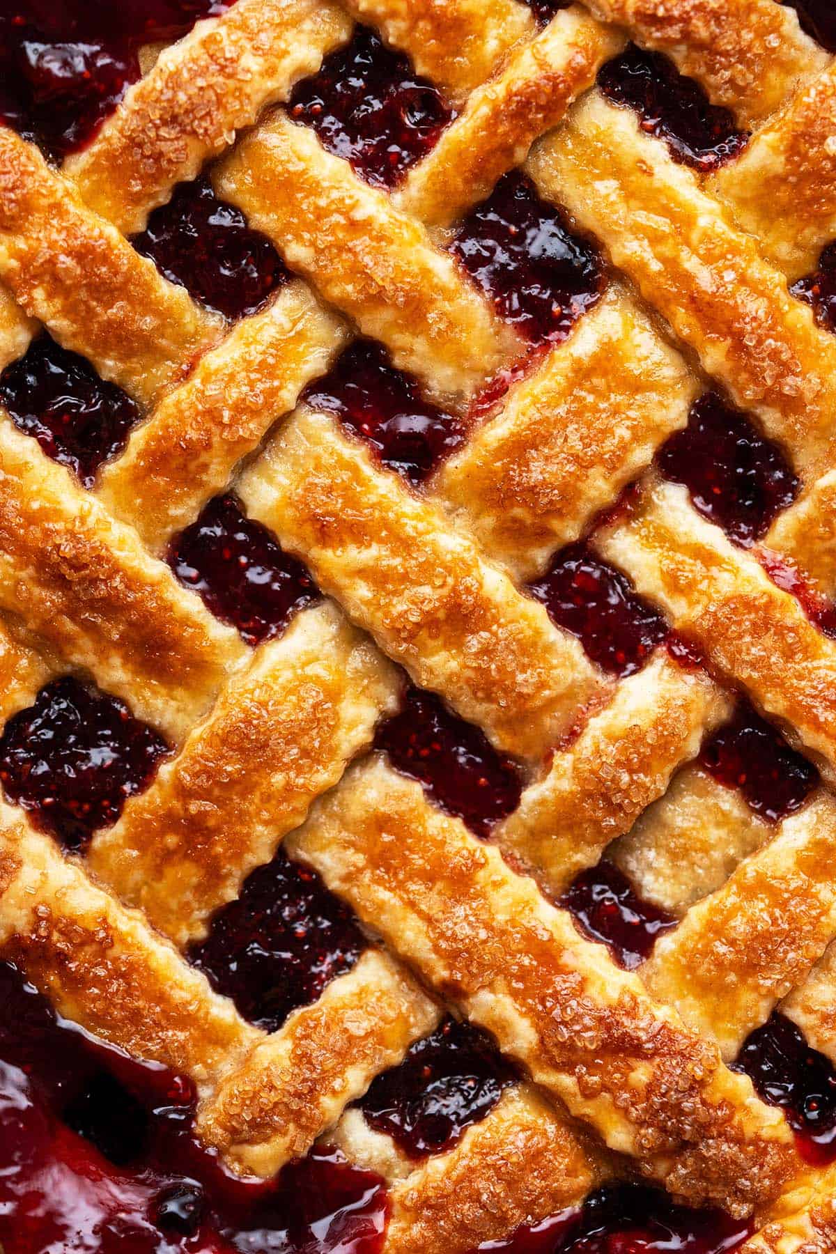 close up overhead view of lattice cranberry pie