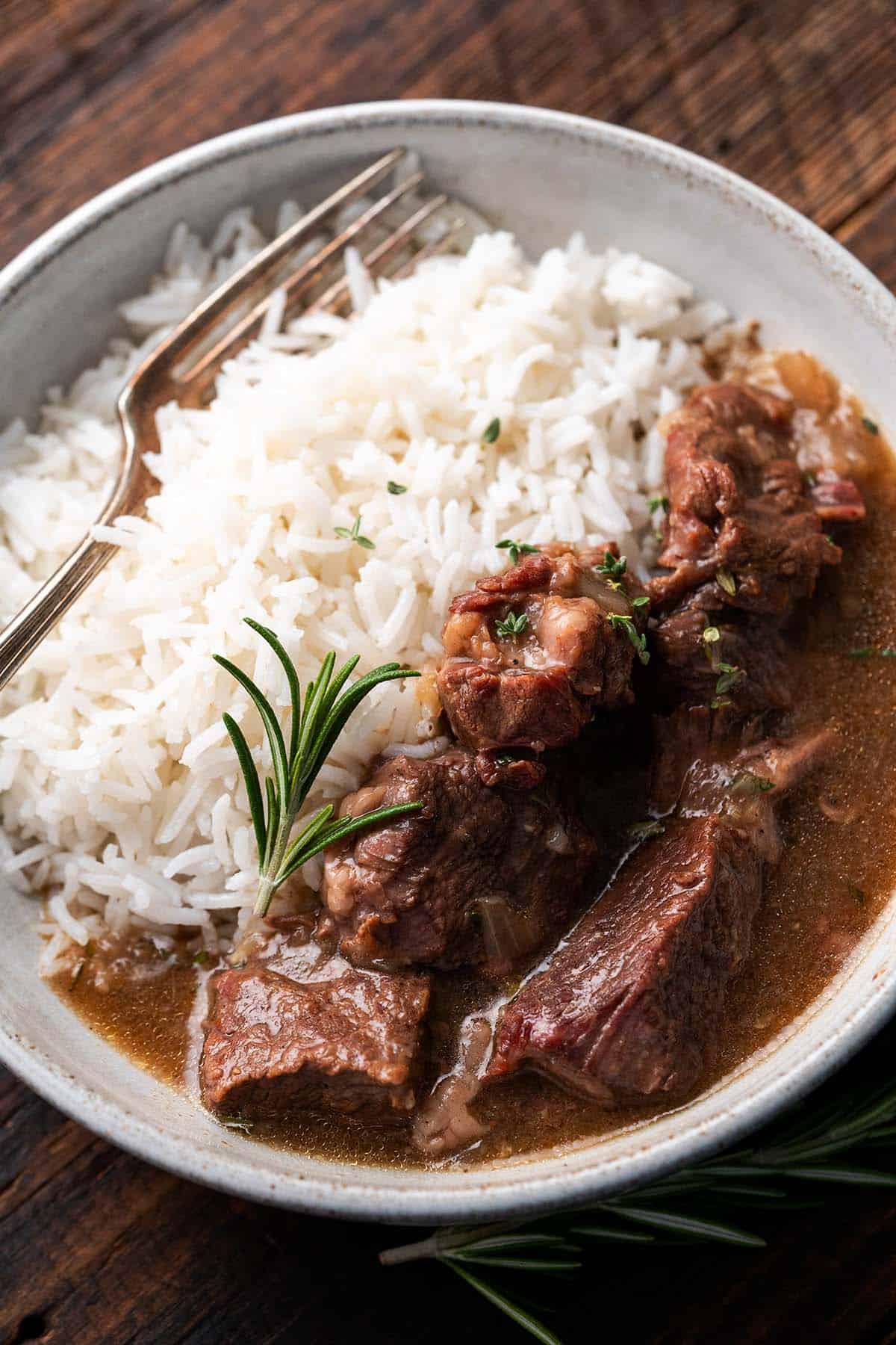 close up top view of instant pot beef tips meal with rice