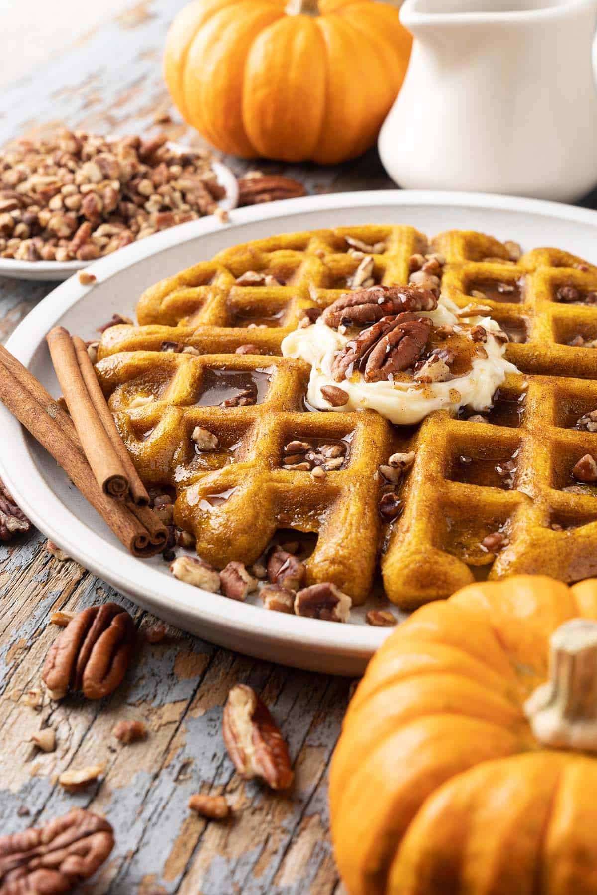 serving plate with pumpkin waffle and pecans