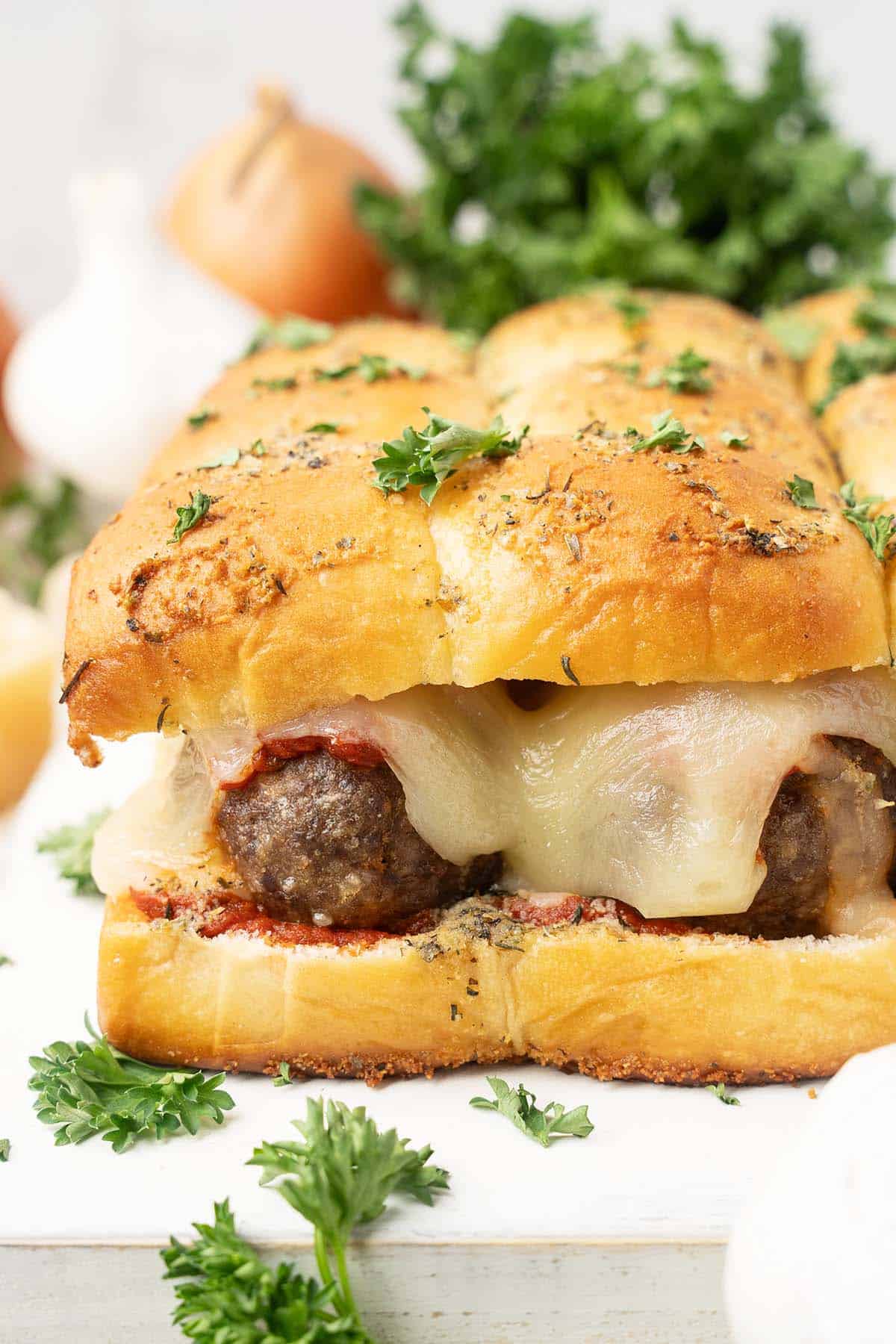 front view of meatball sliders on serving platter