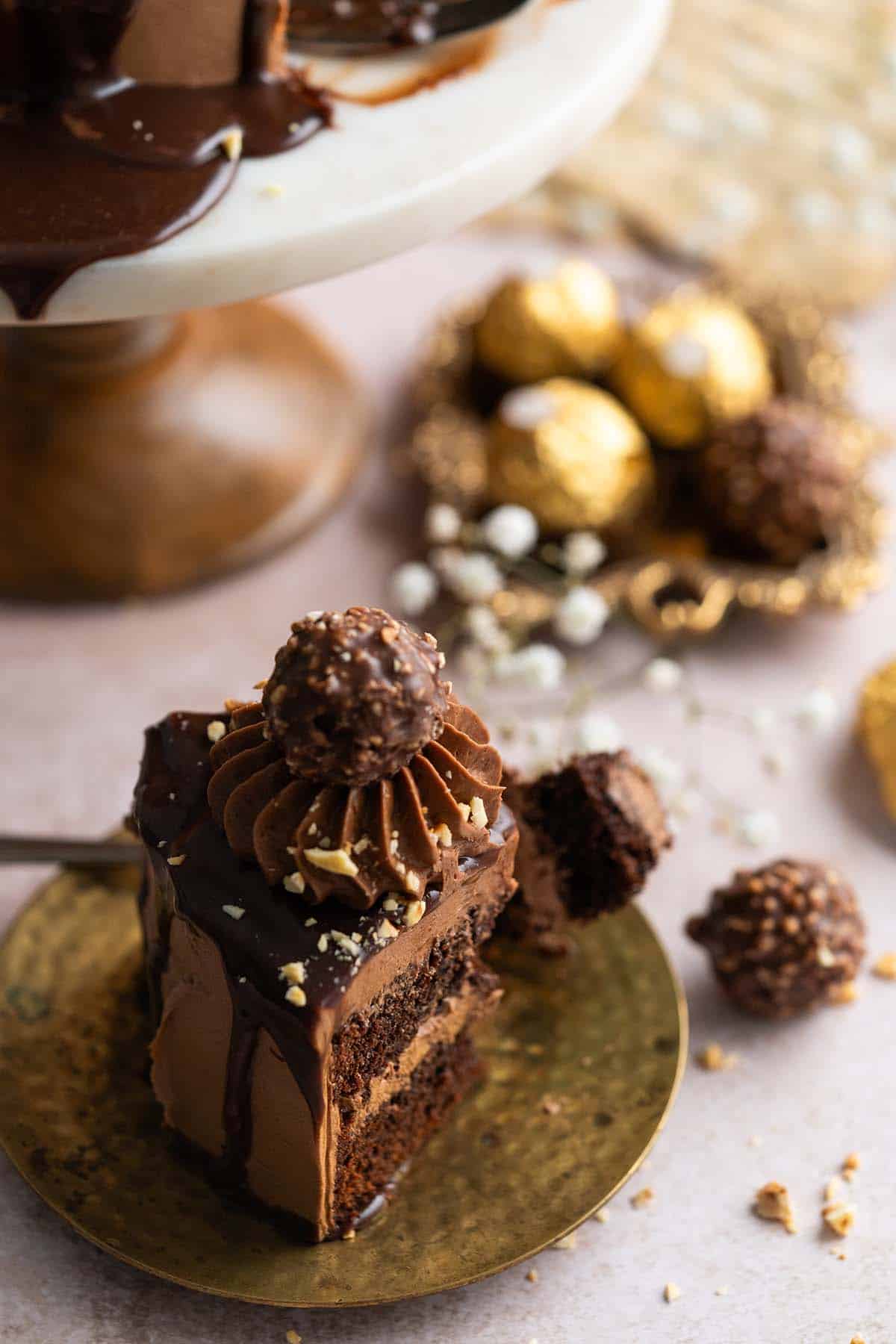 slice of chocolate hazelnut ferraro rocher cake