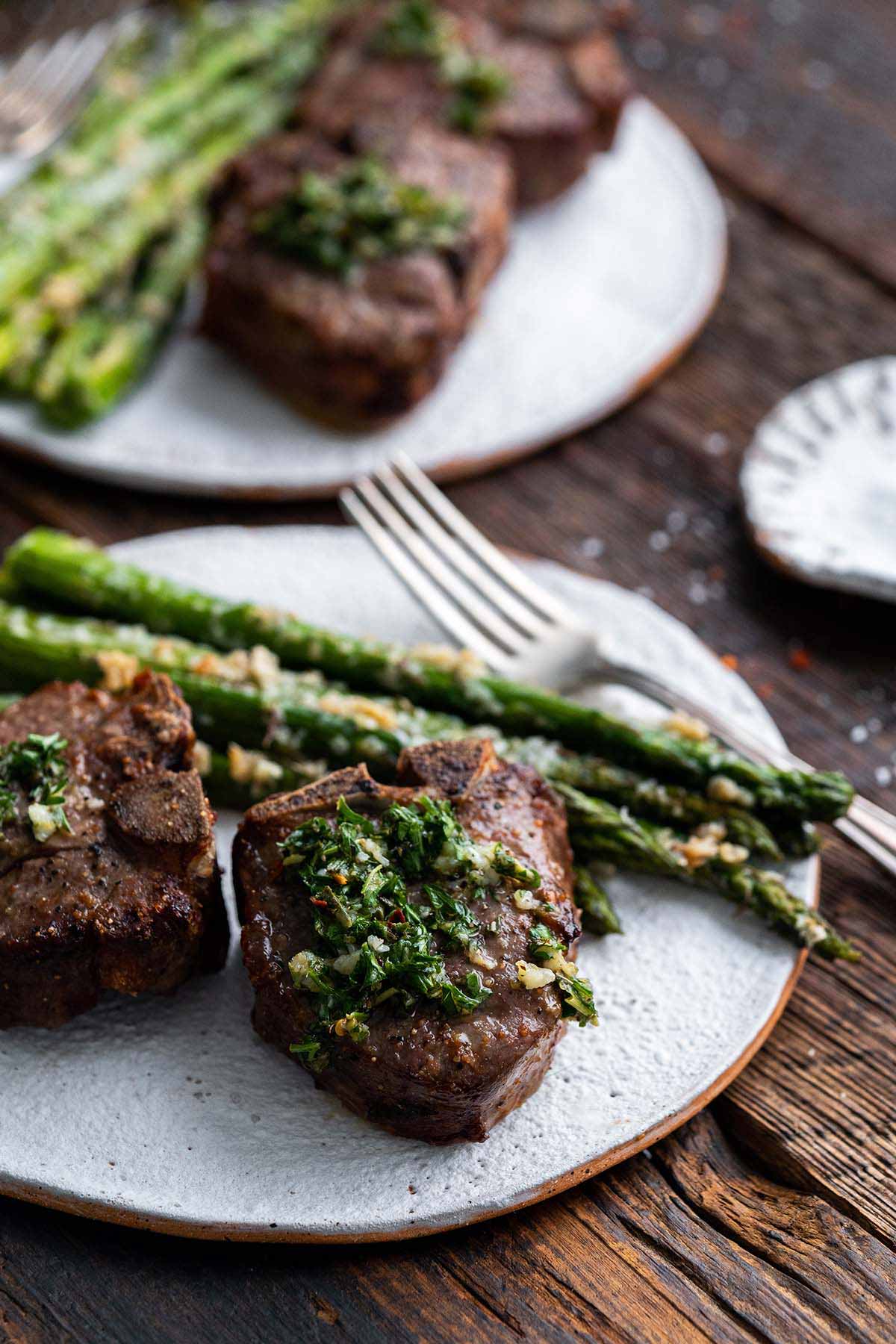 spring dinner of air fryer lamb chops and asparagus