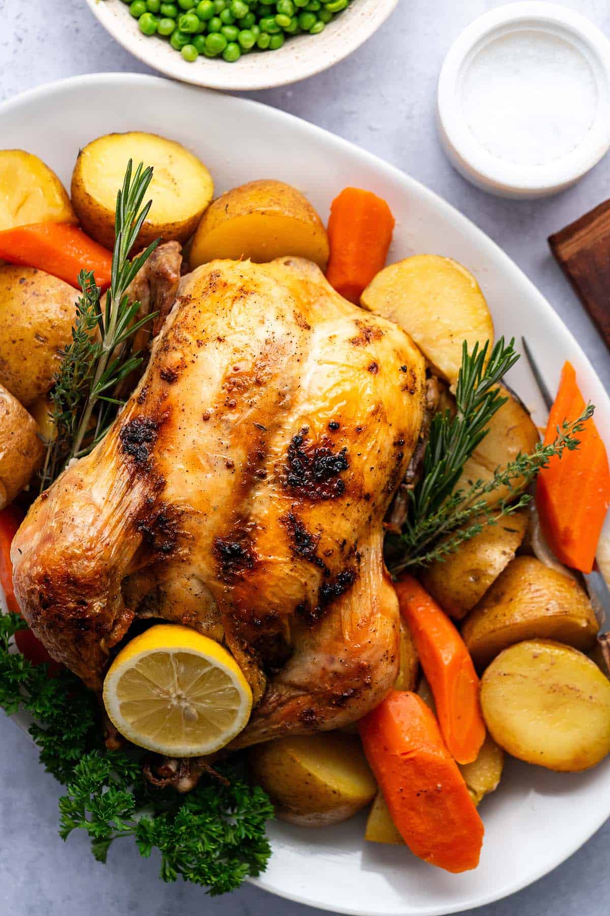 whole roast chicken recipe served on platter