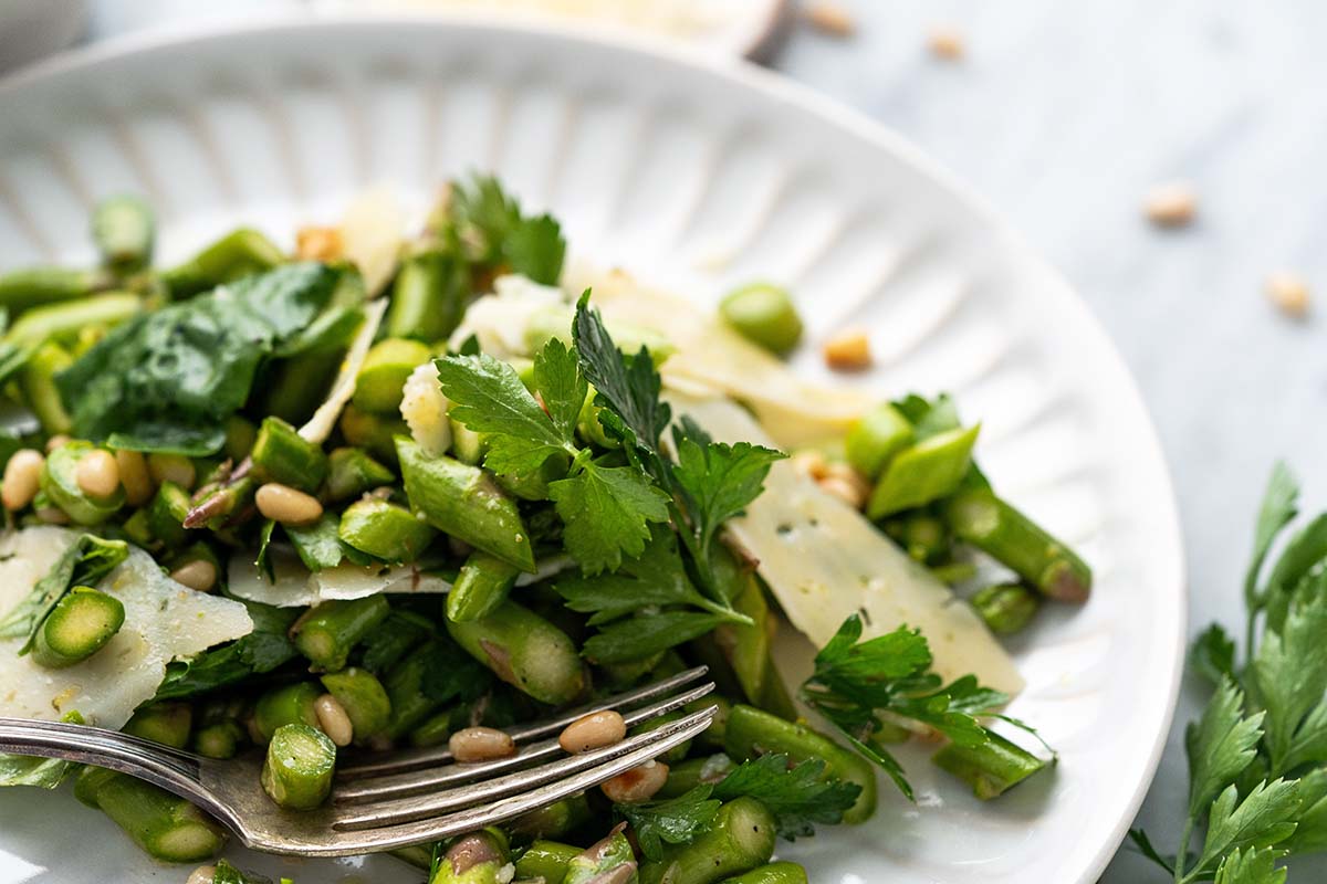 close up of plate with green salad