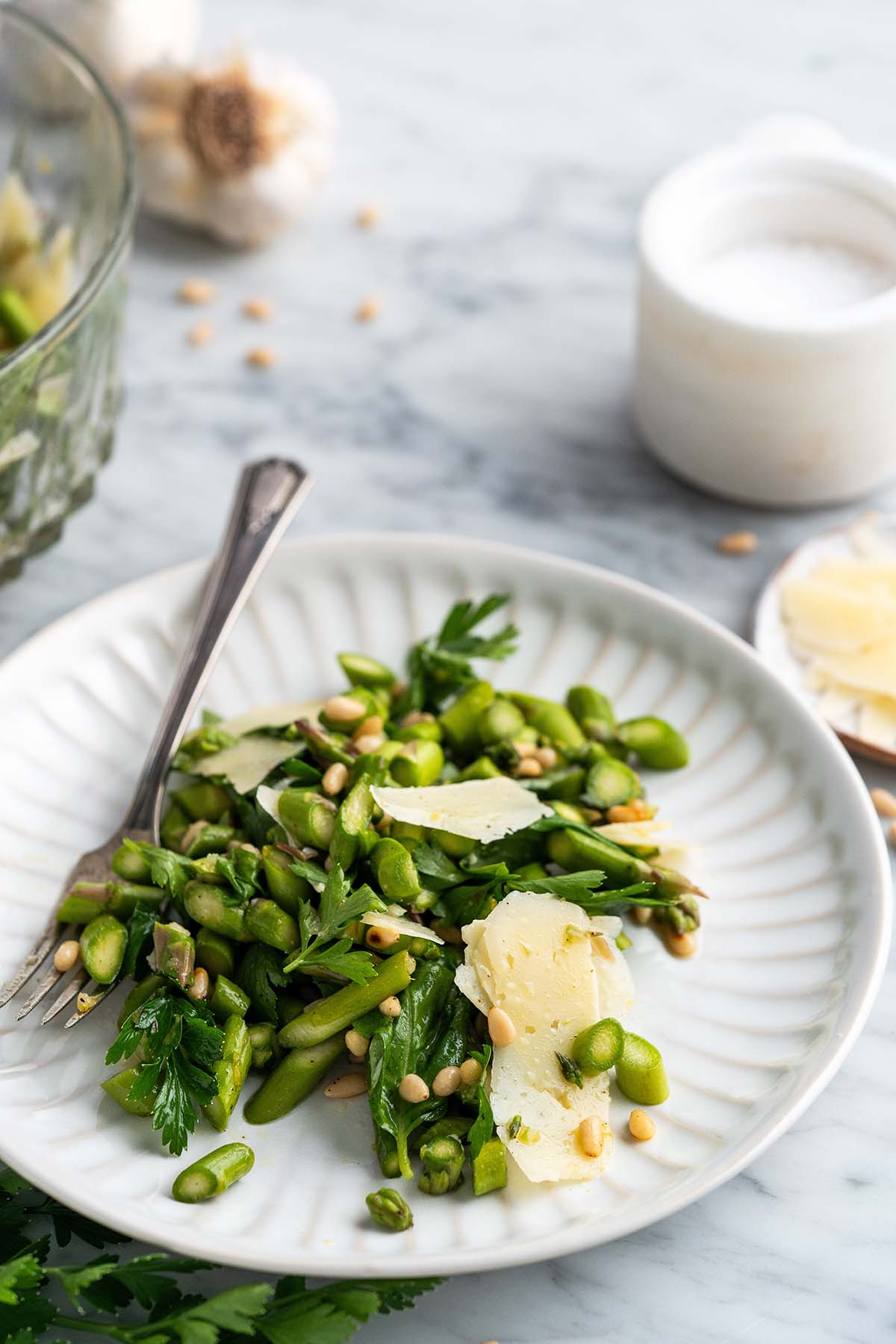 front view of fresh green salad on white plate