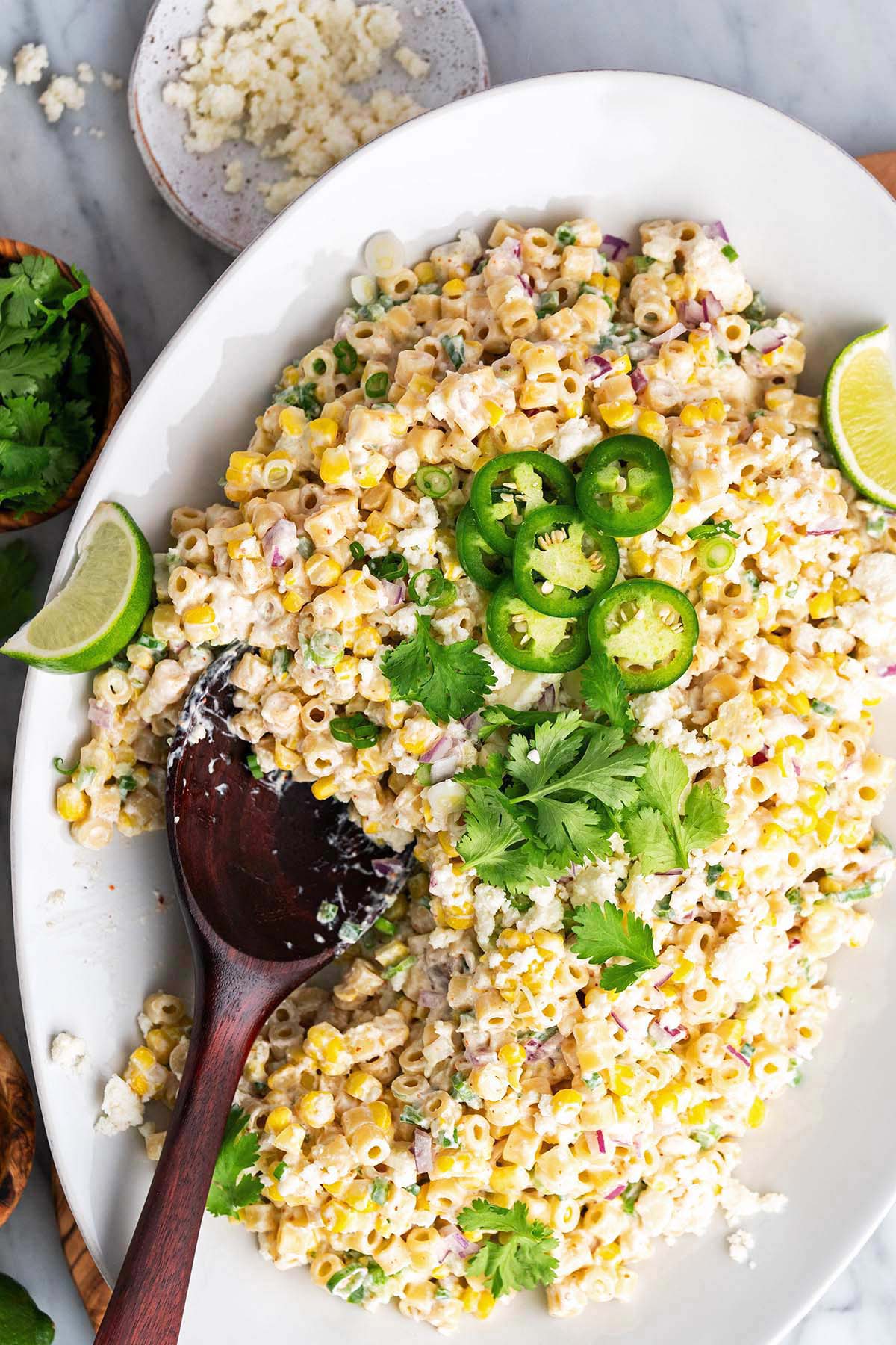 Mexican street corn pasta salad on large platter