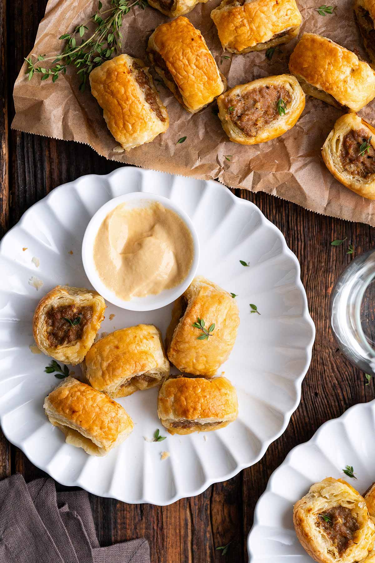 mini sausage rolls using puff pastry served with dijon mustard