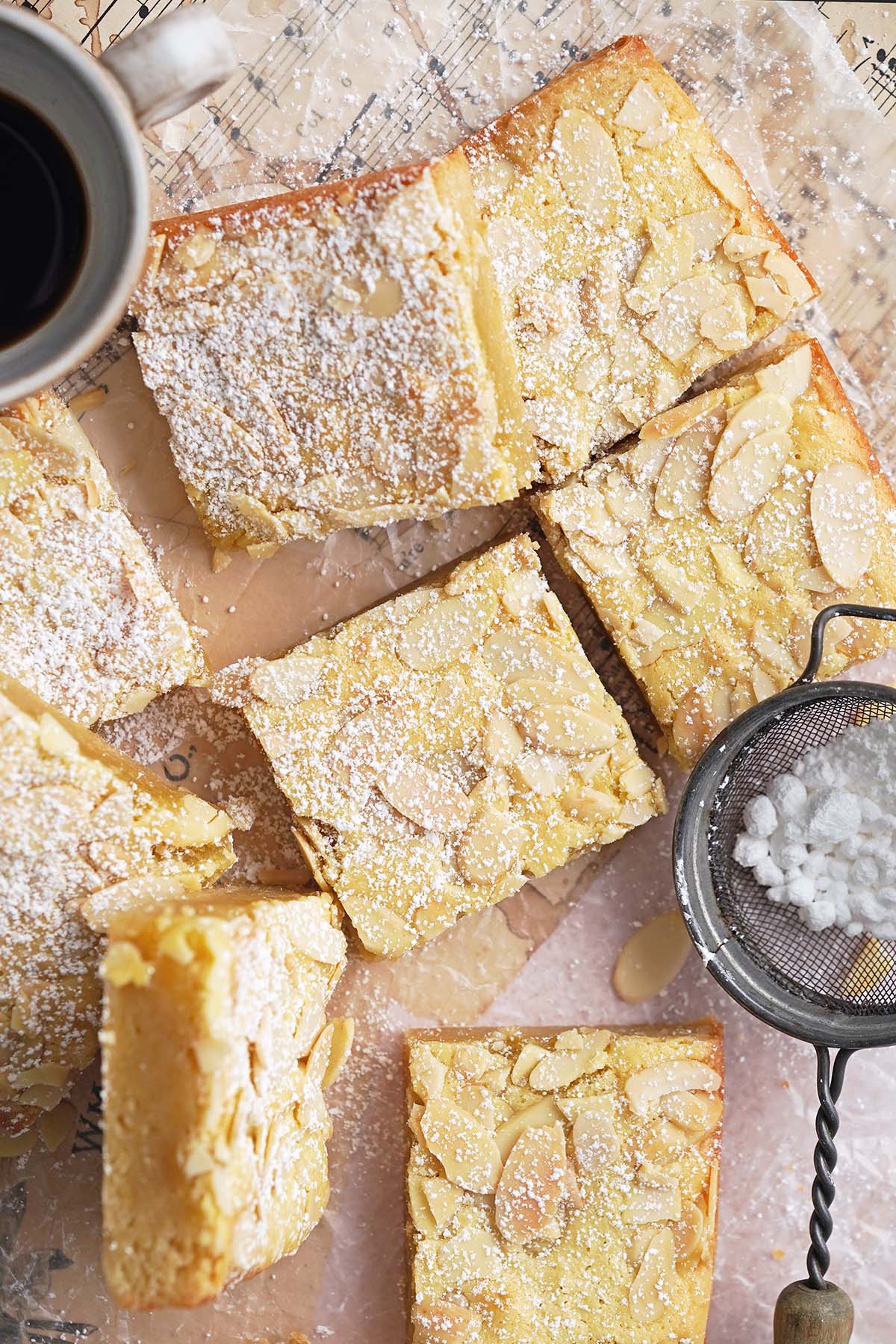 top view of almond croissant blondies dusted with icing sugar